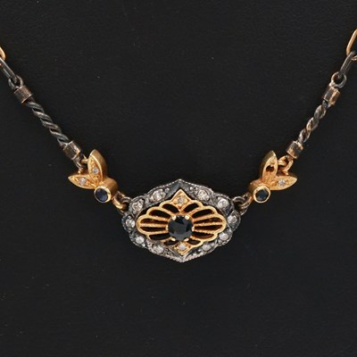 Lot 243 - AN 18CT GOLD AND SILVER DIAMOND SET NECKLACE
