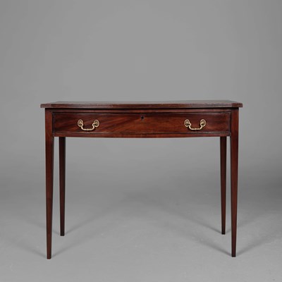Lot 416 - GEORGE III MAHOGANY BOWFRONT WRITING TABLE