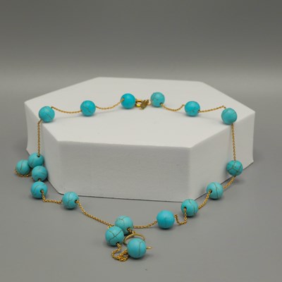 Lot 238 - A YELLOW METAL TURQUOISE SET PENDANT NECKLACE