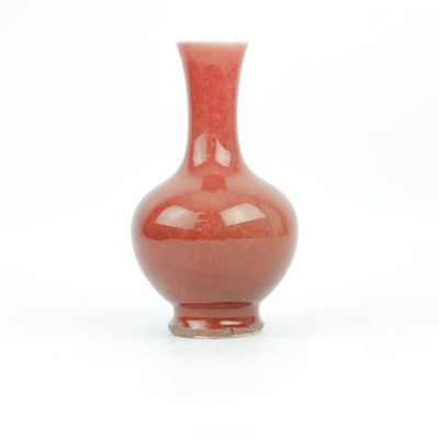 Lot 200 - A CHINESE MONOCHROME SANG DE BOEUF BOTTLE VASE.