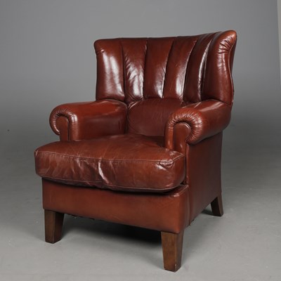 Lot 373 - BROWN LEATHER WING ARMCHAIR