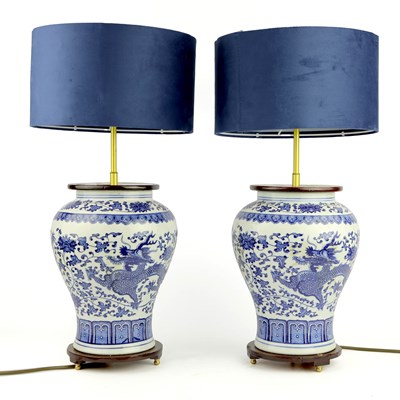 Lot 704 - BLUE AND WHITE CERAMIC TABLE LAMPS, A PAIR