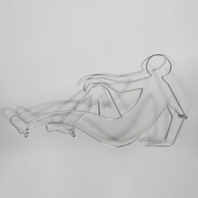 Lot 755 - VINTAGE ALUMINIUM SEATED FIGURE WALL ART