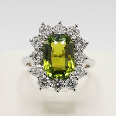 Lot 257 - AN 18CT WHITE GOLD TOURMALINE AND DIAMOND DRESS RING.